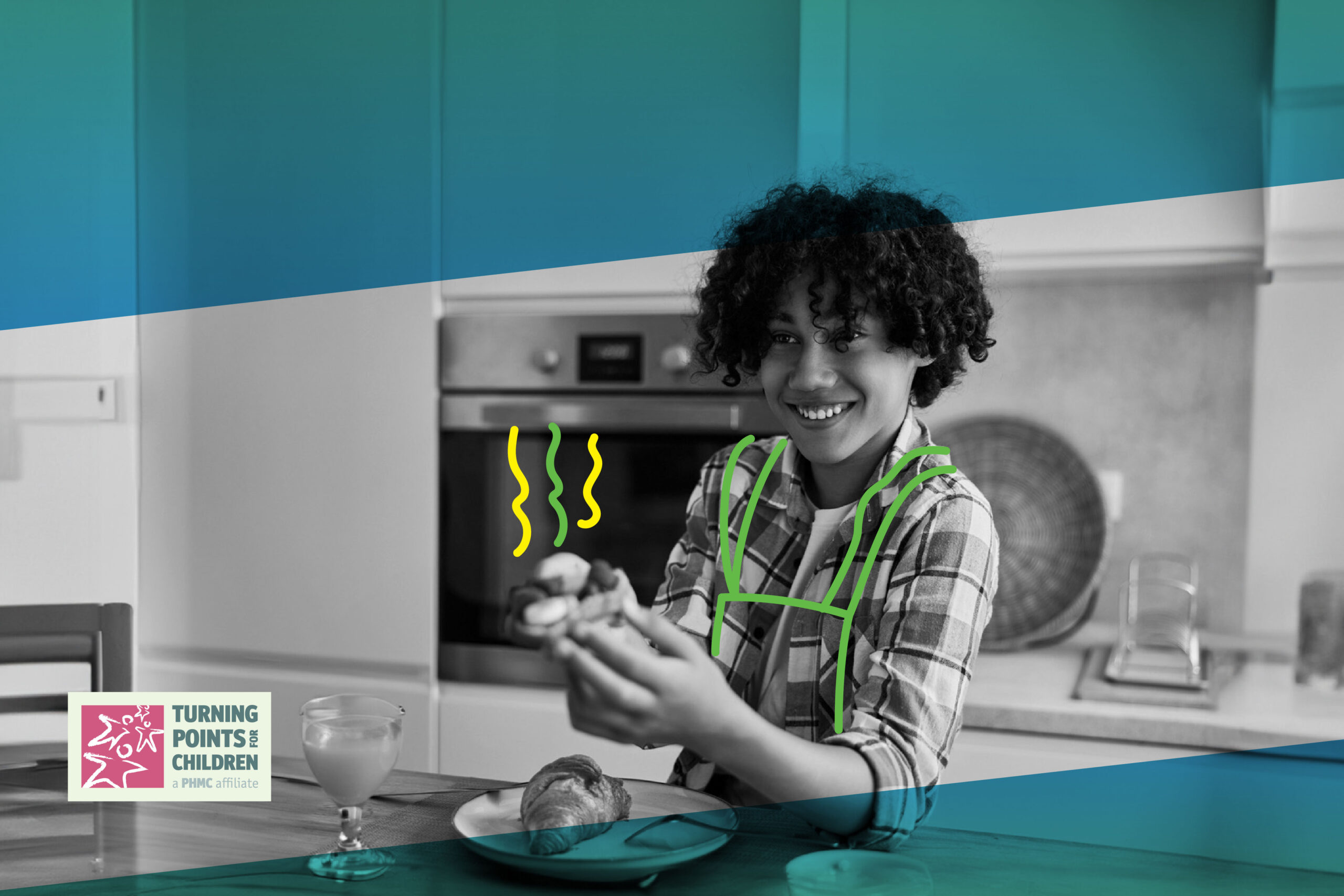 Child sitting at a table with freshly baked snacks.