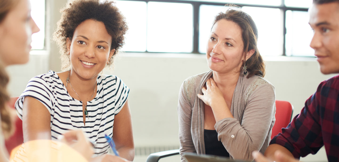 People sitting in a circle during a health education class.